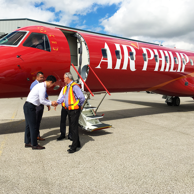 new united goderich with client outside red embraer erj145