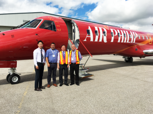 new united goderich delivering embraer erj145 outside hanger