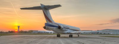 aircraft on runway during sunset