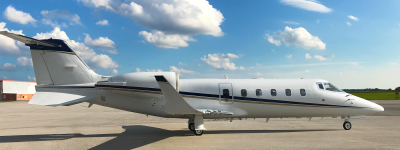 exterior of learjet 60 outside on hangar ramp